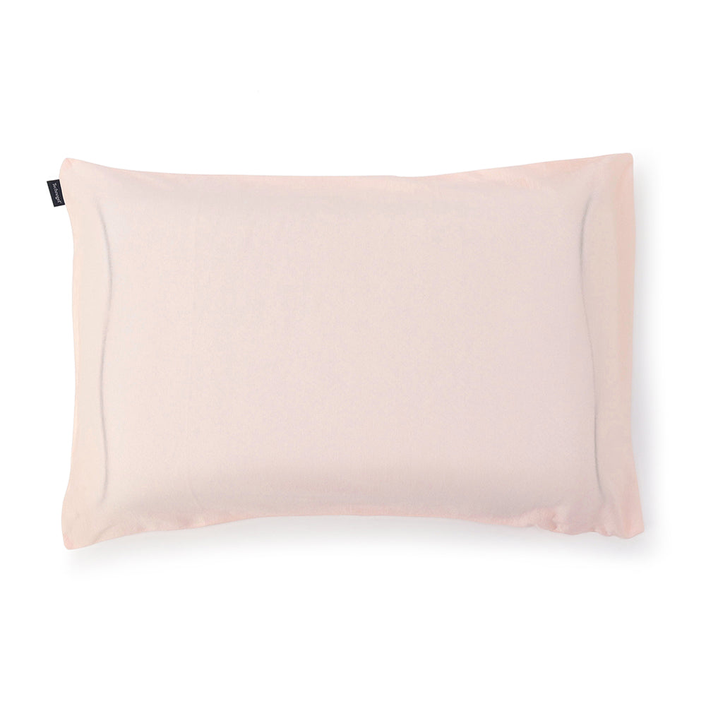 Technogel Sleeping プラチナコットンの専用枕カバーを上から見た画像。パステルピンク。